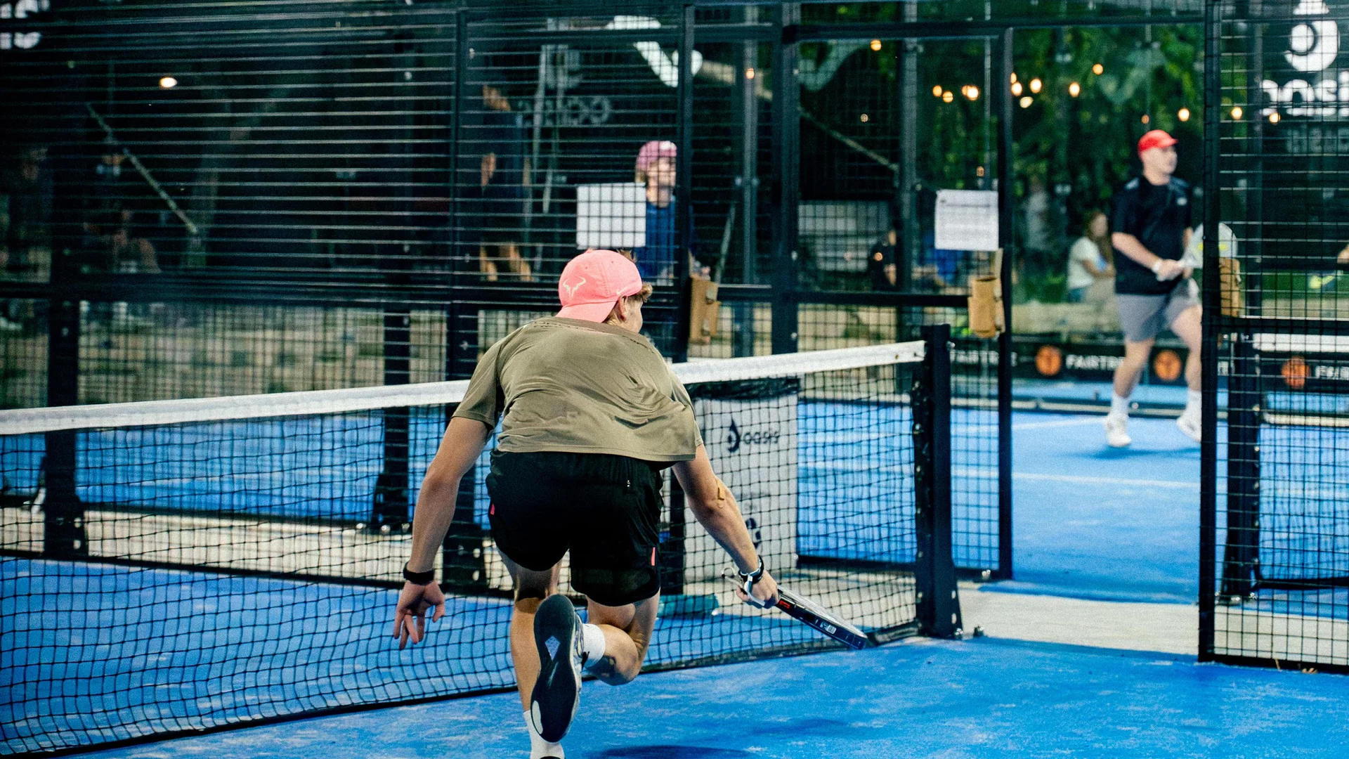 Two players meeting at the net as a point ends